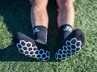 Black Genio grip socks.