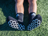 Black Genio grip socks.
